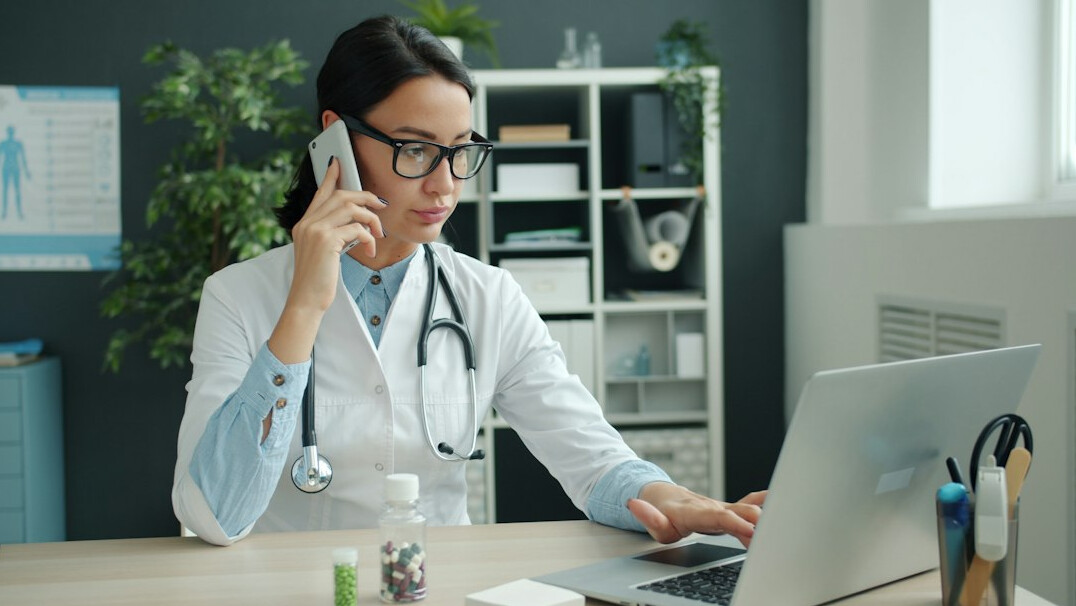doctor consulting patient in office